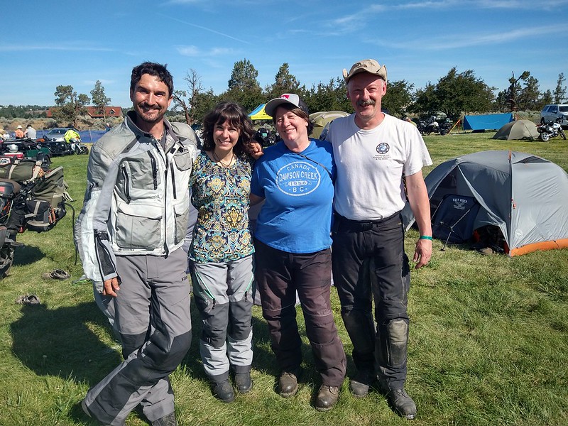 Jayne and Stefan in a photo with RTW motorcycle travelers
          Tim and Marisa Notier